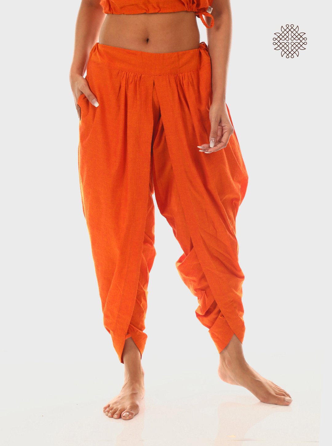 Kesari (saffron) Tulip Yuvaki Dhoti Pants with pockets crafted in 100% cotton